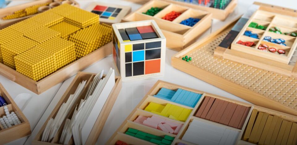 a group of wooden cubes with colorful blocks. Alternative school Ohio