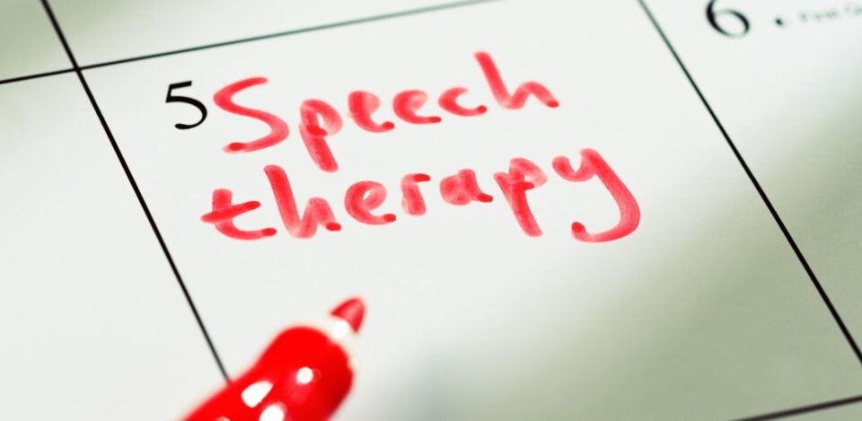 Speech therapy for autism: a close-up of a marker circling a scheduled therapy session on a calendar, symbolizing planning and commitment to progress